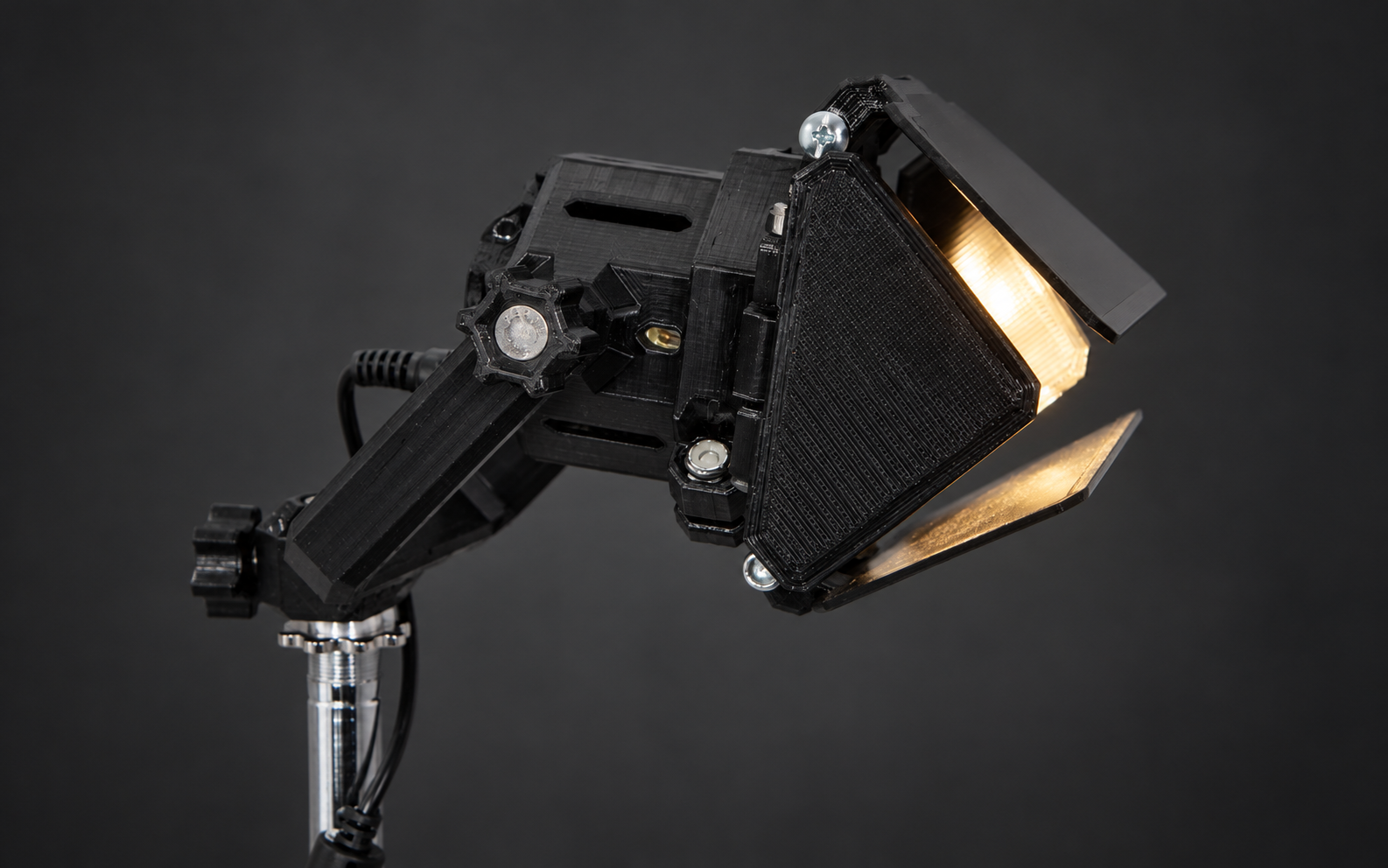 MiniCine Creator Edition with diffusion, barn doors, and its yoke mount